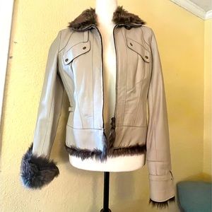 Vintage Spiegel Size 8 winter white leather coat with fur trim.